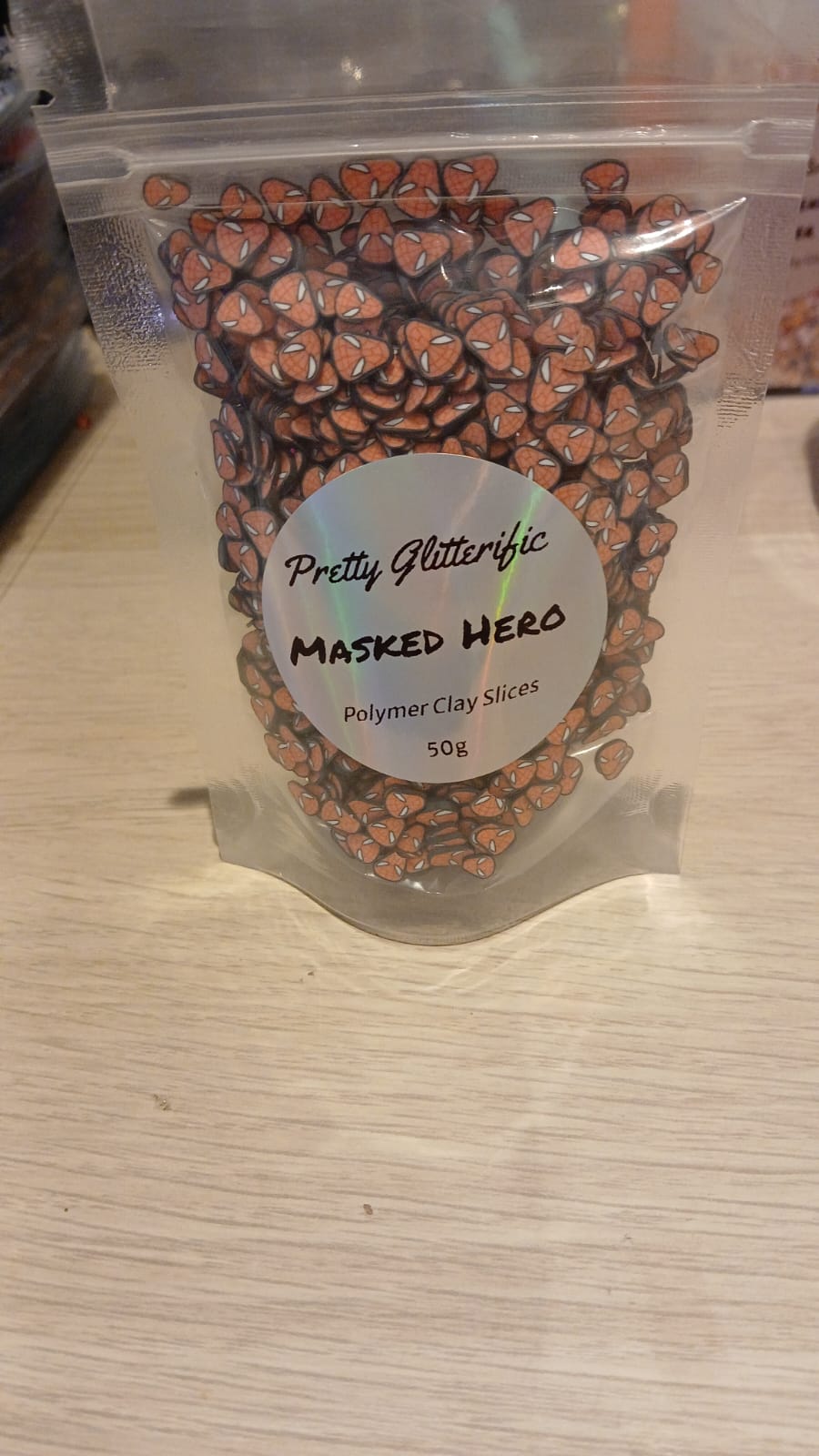 Masked hero polymer clay slices